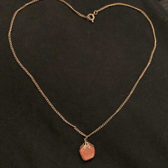 A Sunstone pendant on a Gold toned chain 19” inches. - Picture 5 of 5